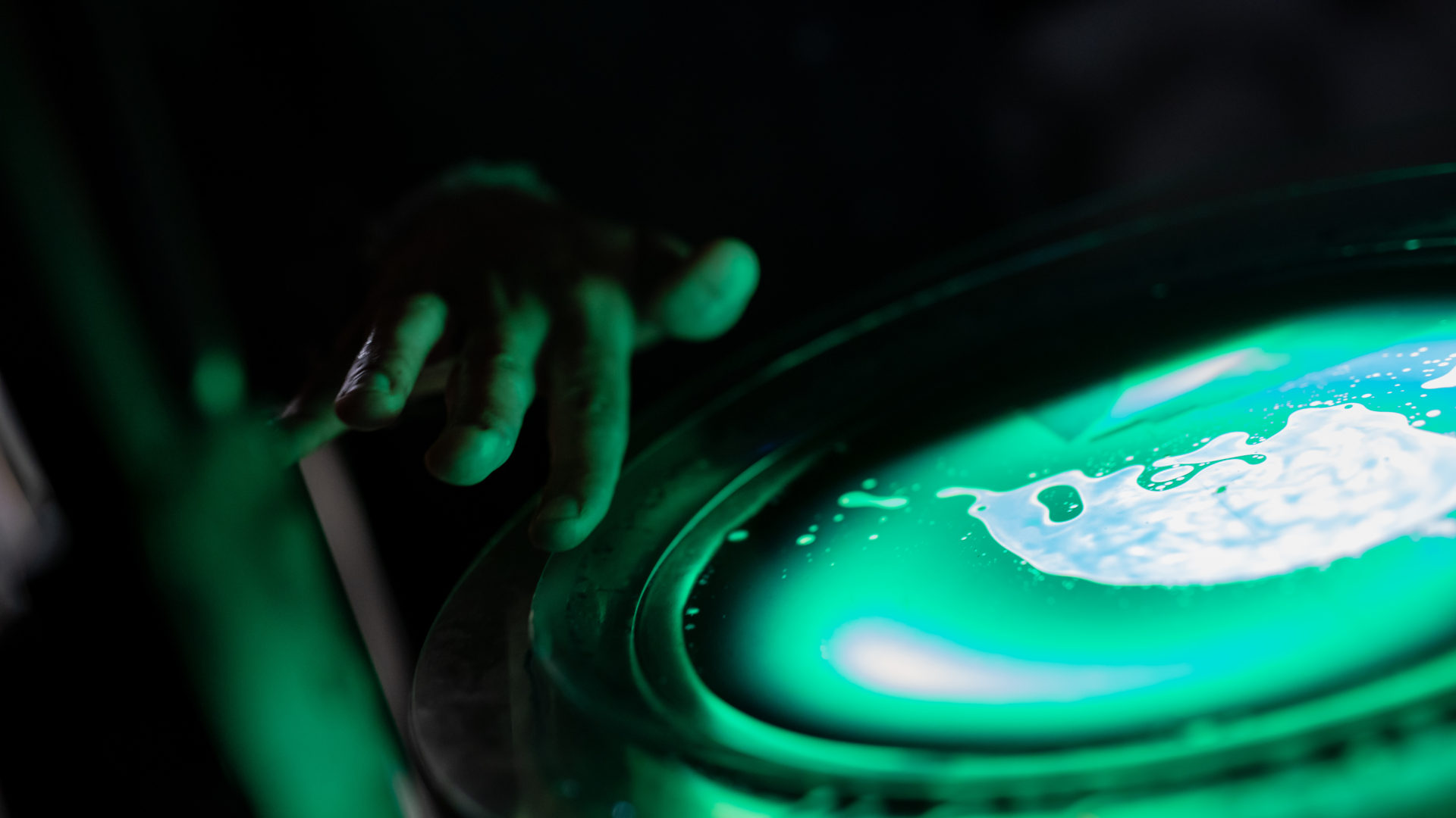 Close up of Third Circle Visuals doing projection art at The Virgil